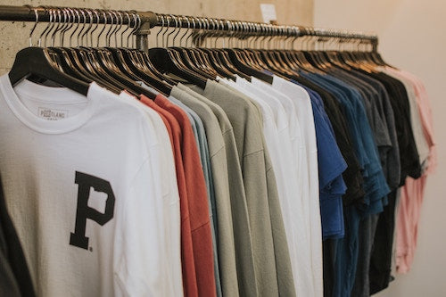 Clothes rack with men's shirts.